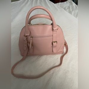 Never used woman’s pink hand bag.clutch with optional strap.